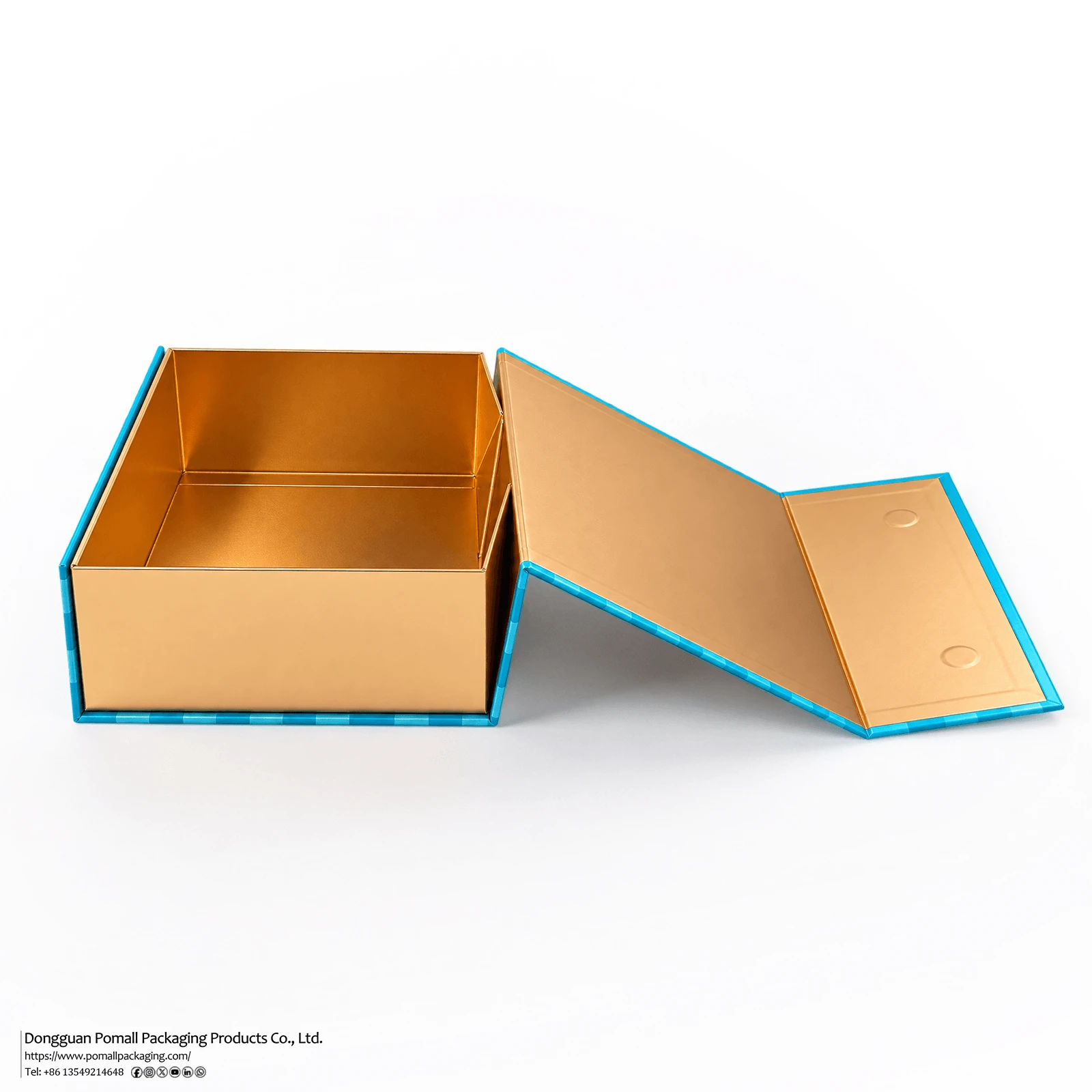 Open magnetic folding gift box showing gold interior and collapsible structure Open magnetic folding gift box showing gold interior and collapsible structure