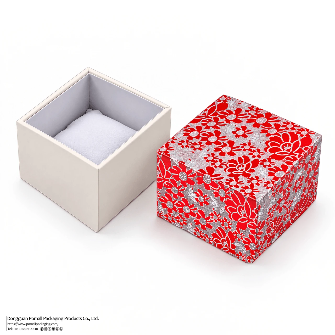 Floral paper watch box displaying a wristwatch Floral paper watch box displaying a wristwatch